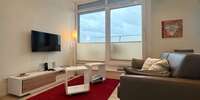 Wohnzimmer mit Zugang Balkon