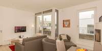 Wohnzimmer mit Zugang Balkon