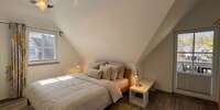Schlafzimmer mit Balkonzugang